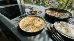 Milanesa de pollo crujiente con quínoa inflada y parmesano lista en 25 minutos